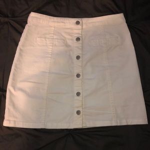 White khaki skirt; ORANGE CREEK BOUTIQUE